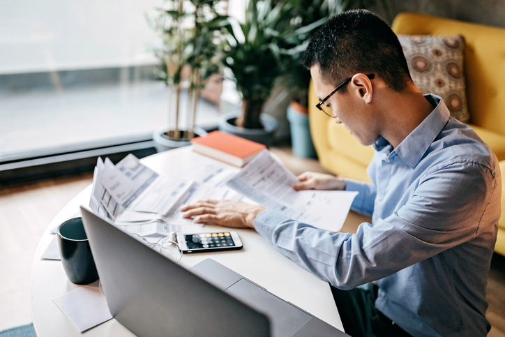 man reading paper